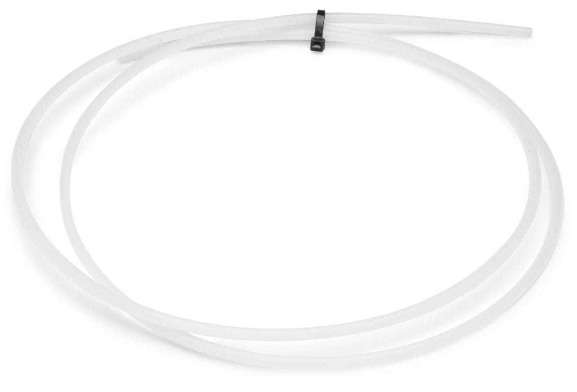 Coiled white plastic tubing secured with a black zip tie