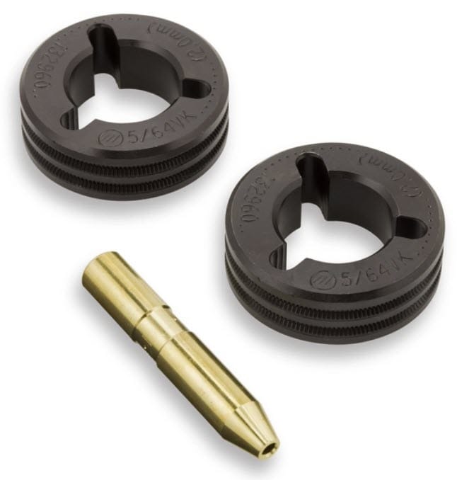 Two black circular metal guides and one brass cylindrical pin