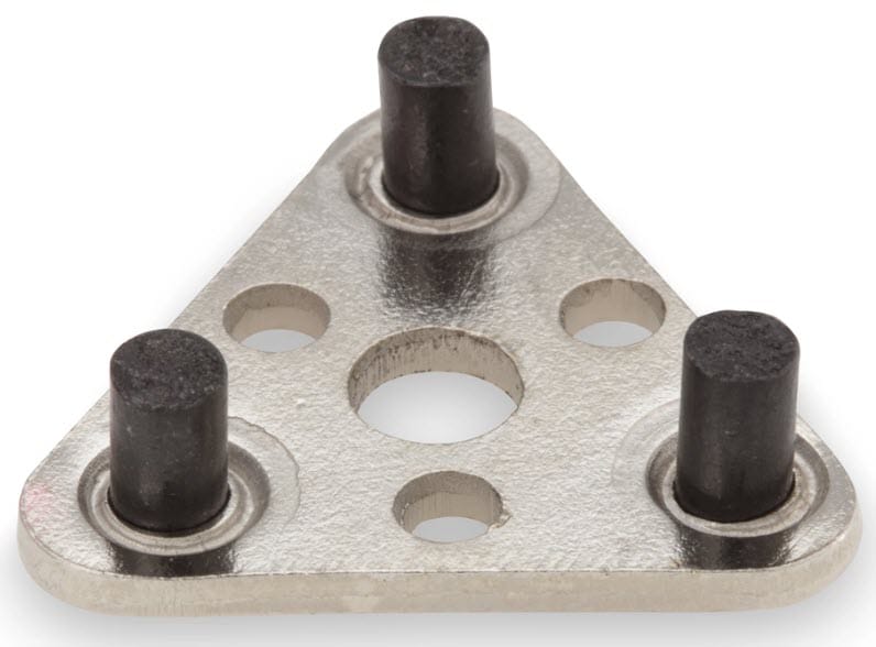 Triangular metal plate with three vertical black cylindrical pins and central mounting holes