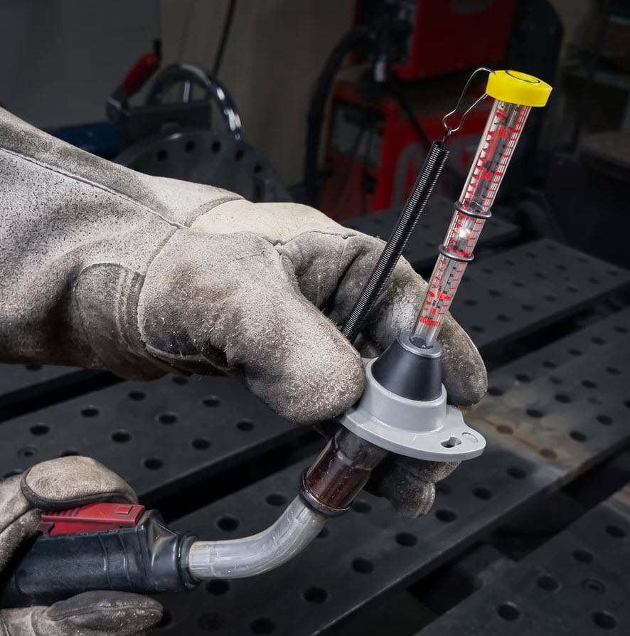 Strong Hand gas flow tester attached to a welding torch nozzle