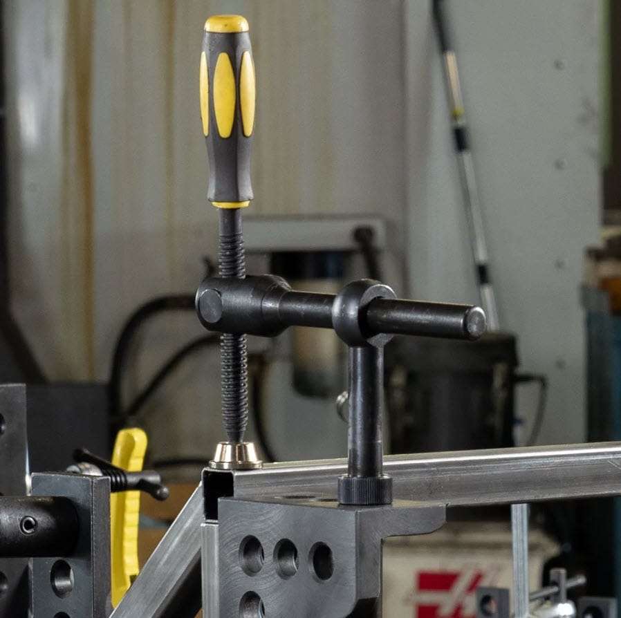 BuildPro metal welding clamp with vertical handle and horizontal adjustment bar