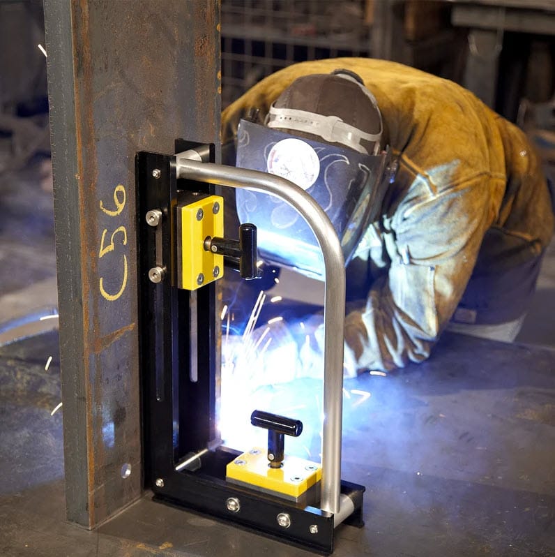 Magswitch magnetic welding square holding steel beam in place while welder works