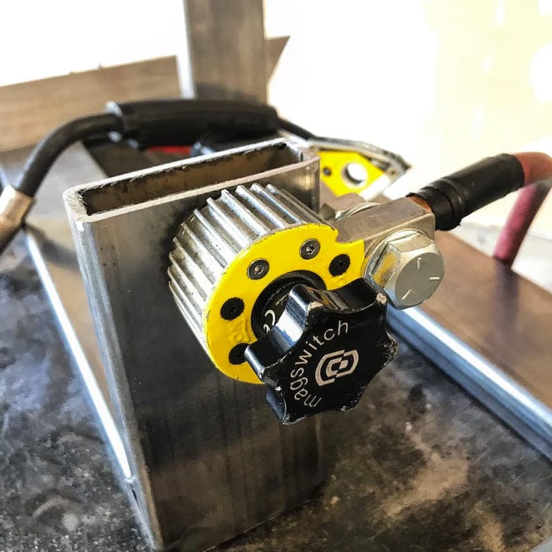 Magswitch magnetic ground clamp attached to a rectangular steel tube