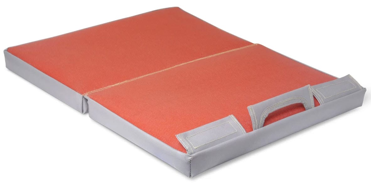 Black Stallion orange rectangular welding knee pad with grey trim and carrying handle