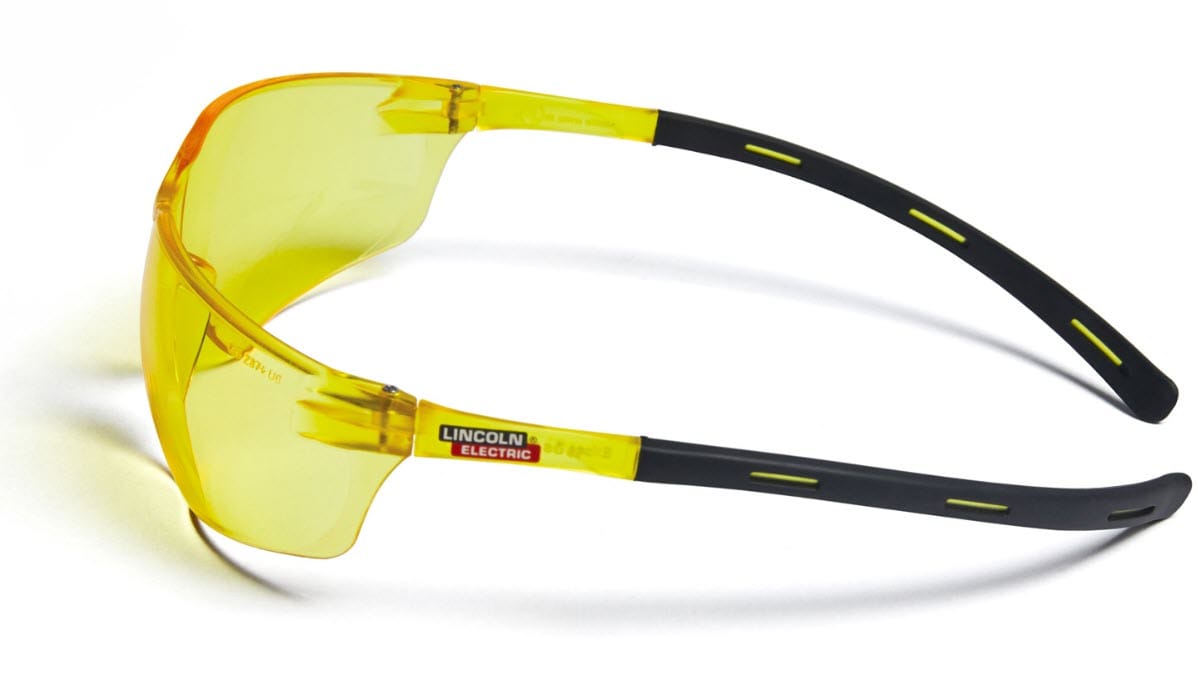 Lincoln Electric safety glasses with yellow lenses and black temples