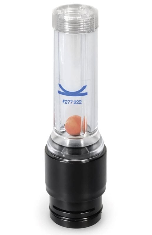 Clear plastic cylinder with black base and orange ball inside