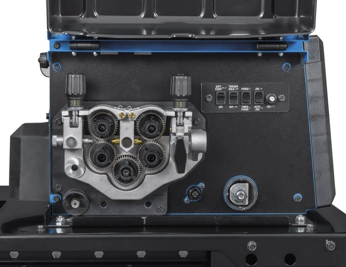 Miller wire drive assembly with four drive rolls and control switches