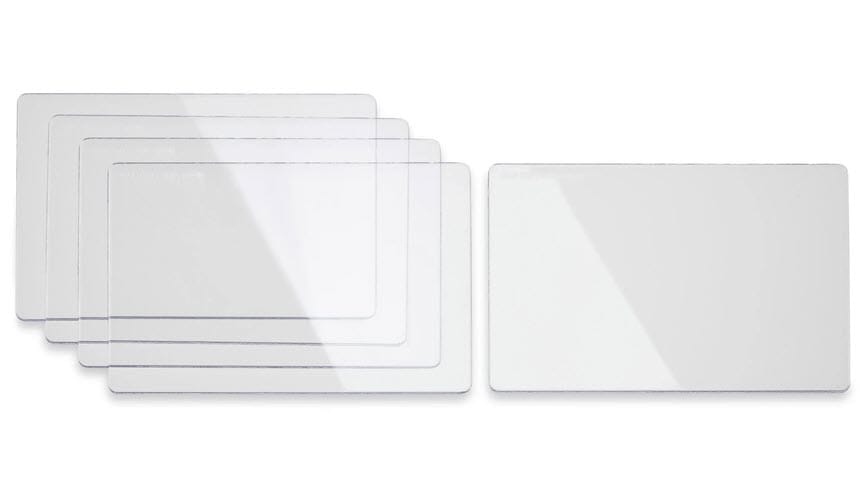 Stack of five rectangular clear plastic cards